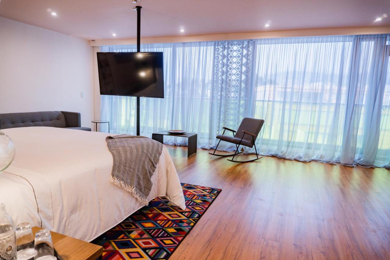 Hotel V1501 Pasto Esterno foto A bedroom at the hotel