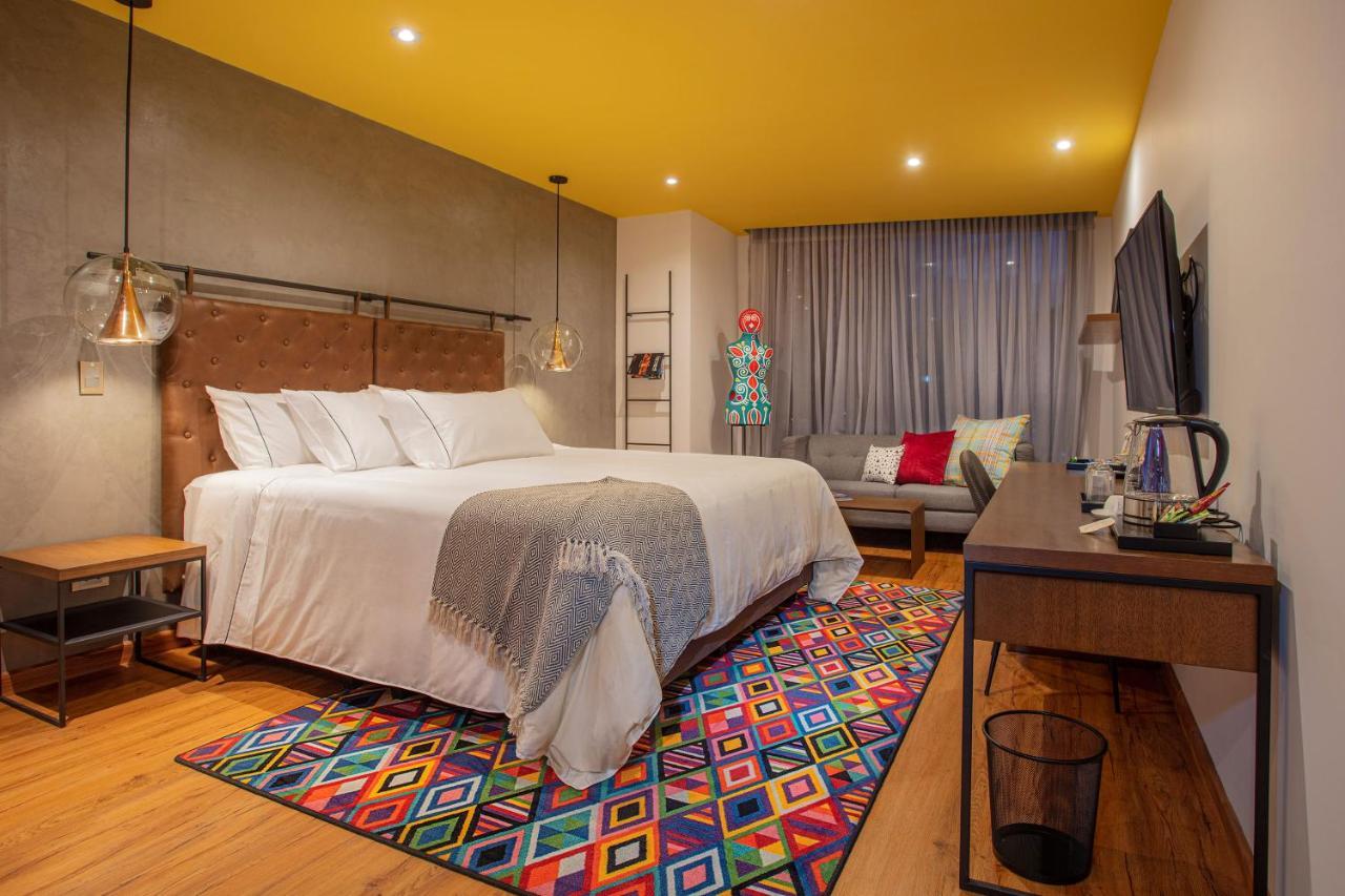 Hotel V1501 Pasto Esterno foto A room at the hotel