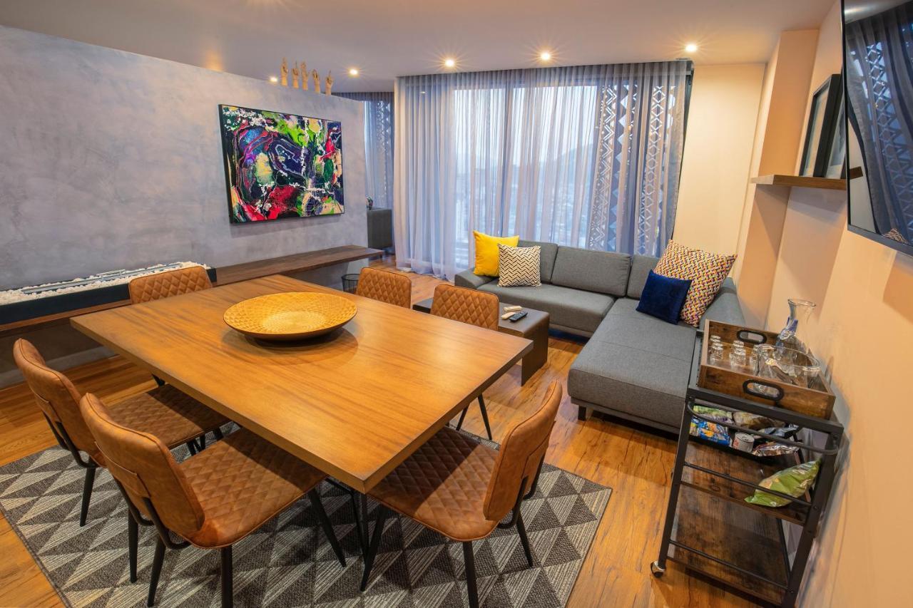 Hotel V1501 Pasto Esterno foto A living room in a condominium
